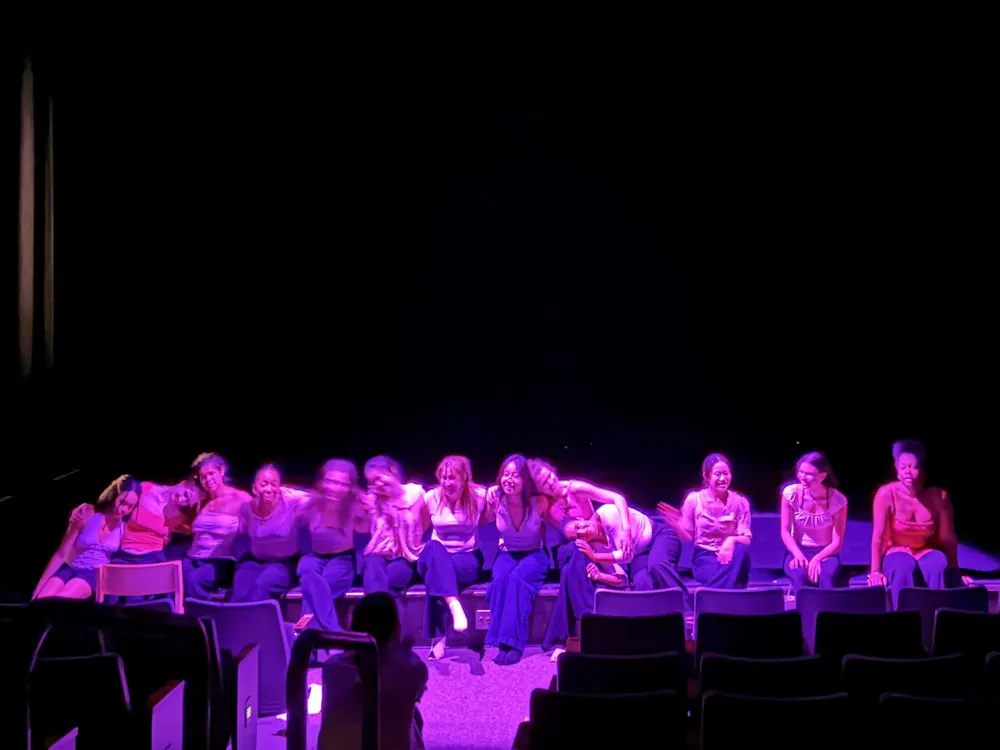 A group of eXpressions dancers line the stage.