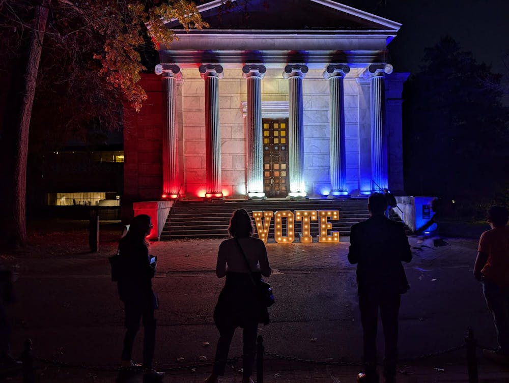 <h5>People gather outside of Whig Hall on election night.</h5><h6>Yacoub Kahkajian / The Daily Princetonian</h6>