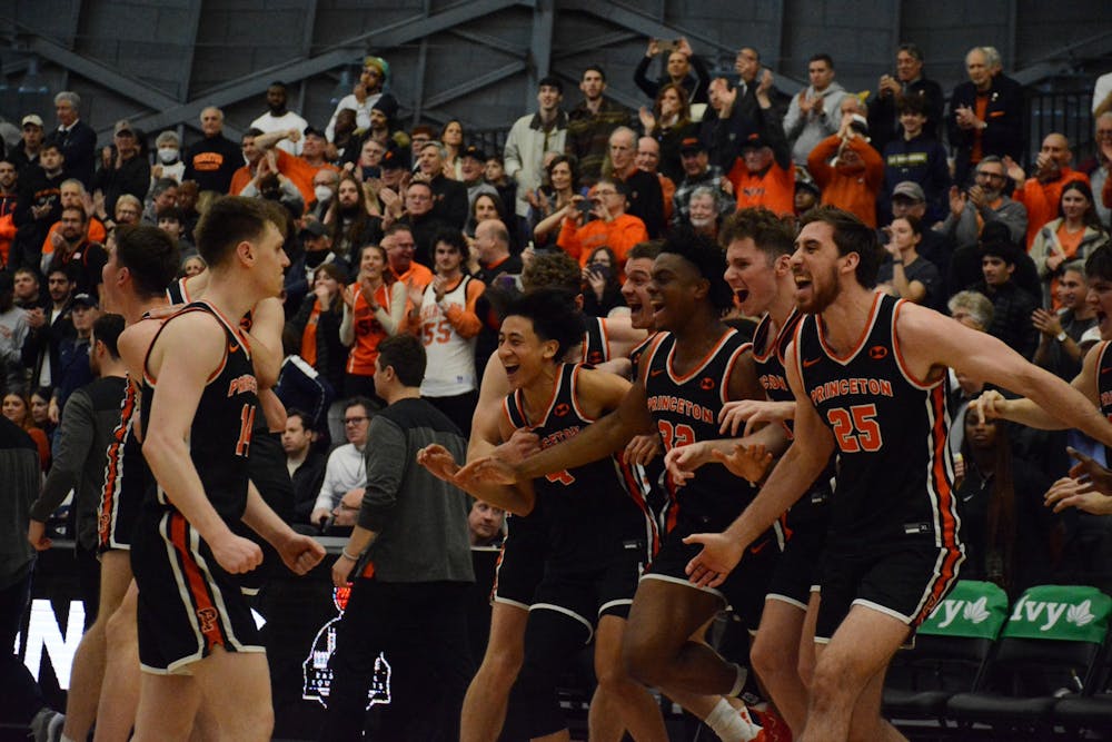 <h5>The Tigers celebrate as the final buzzer sounds.&nbsp;</h5>
<h6>Nathan Gage / The Daily Princetonian</h6>
