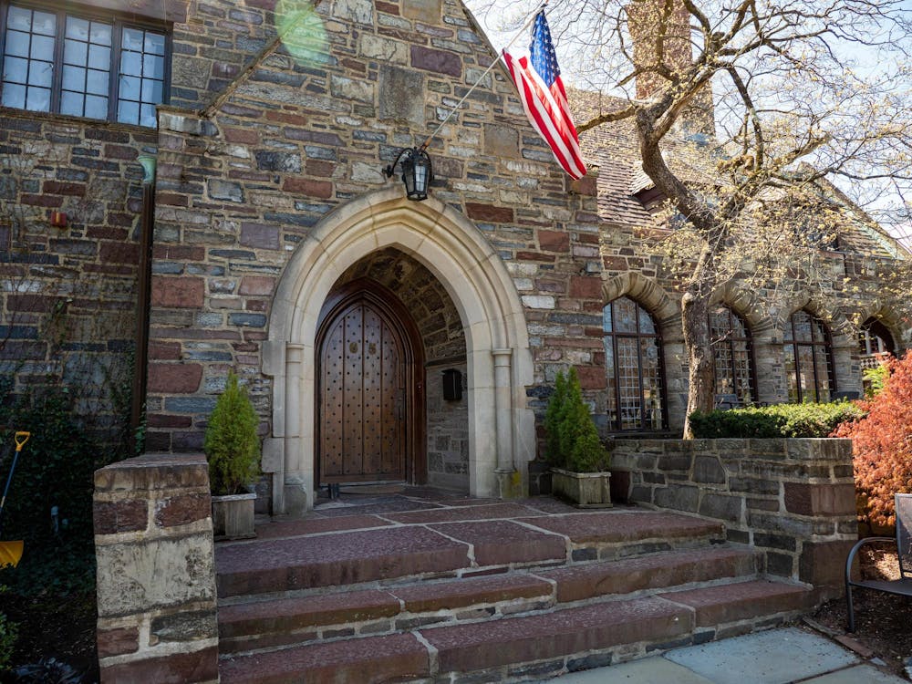 Facade of a building with an American flag over the entrance