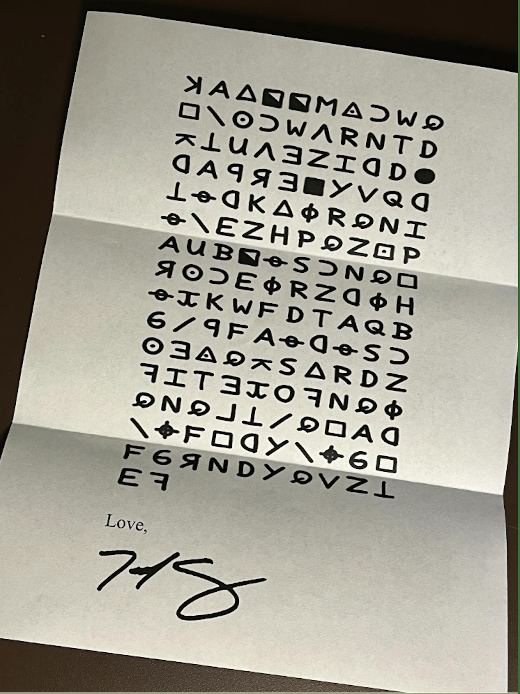Image of a sheet of paper with cipher text written on it, signed by Ted Cruz.