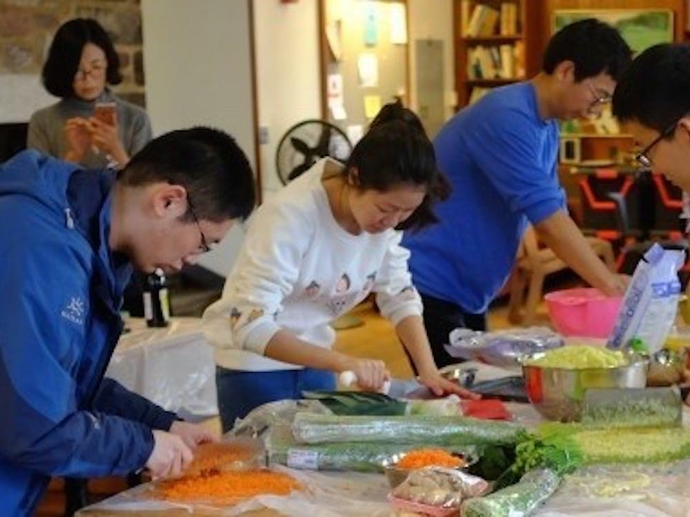 Students cooking at an event with Princeton's Association of Chinese Students and Scholars. Courtesy of ACSSPU.
