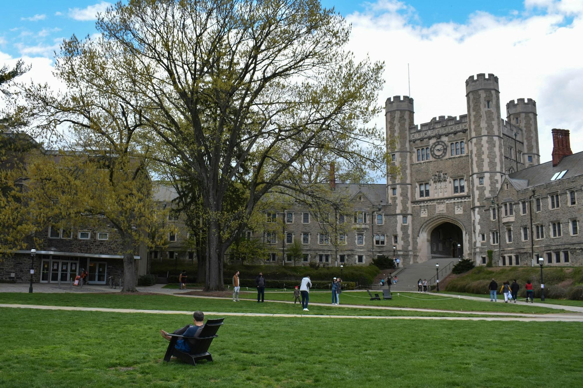 Photo of people outside on the grass in front of Blair Arch.