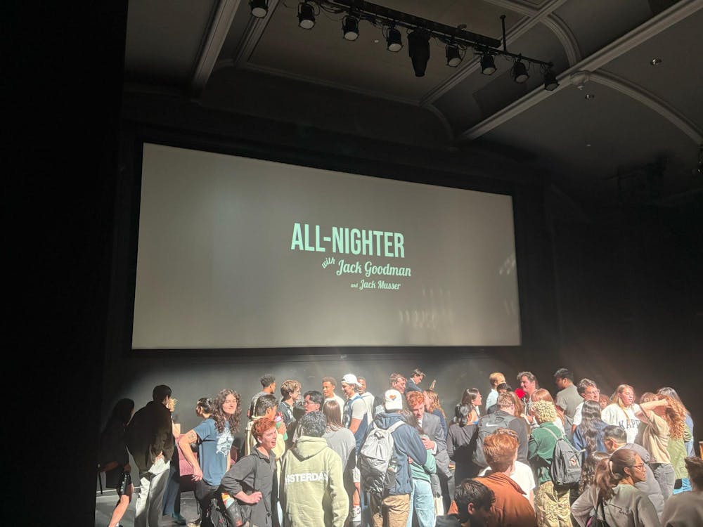 A crowd of individuals gather after the end of the All-Nighter show.
