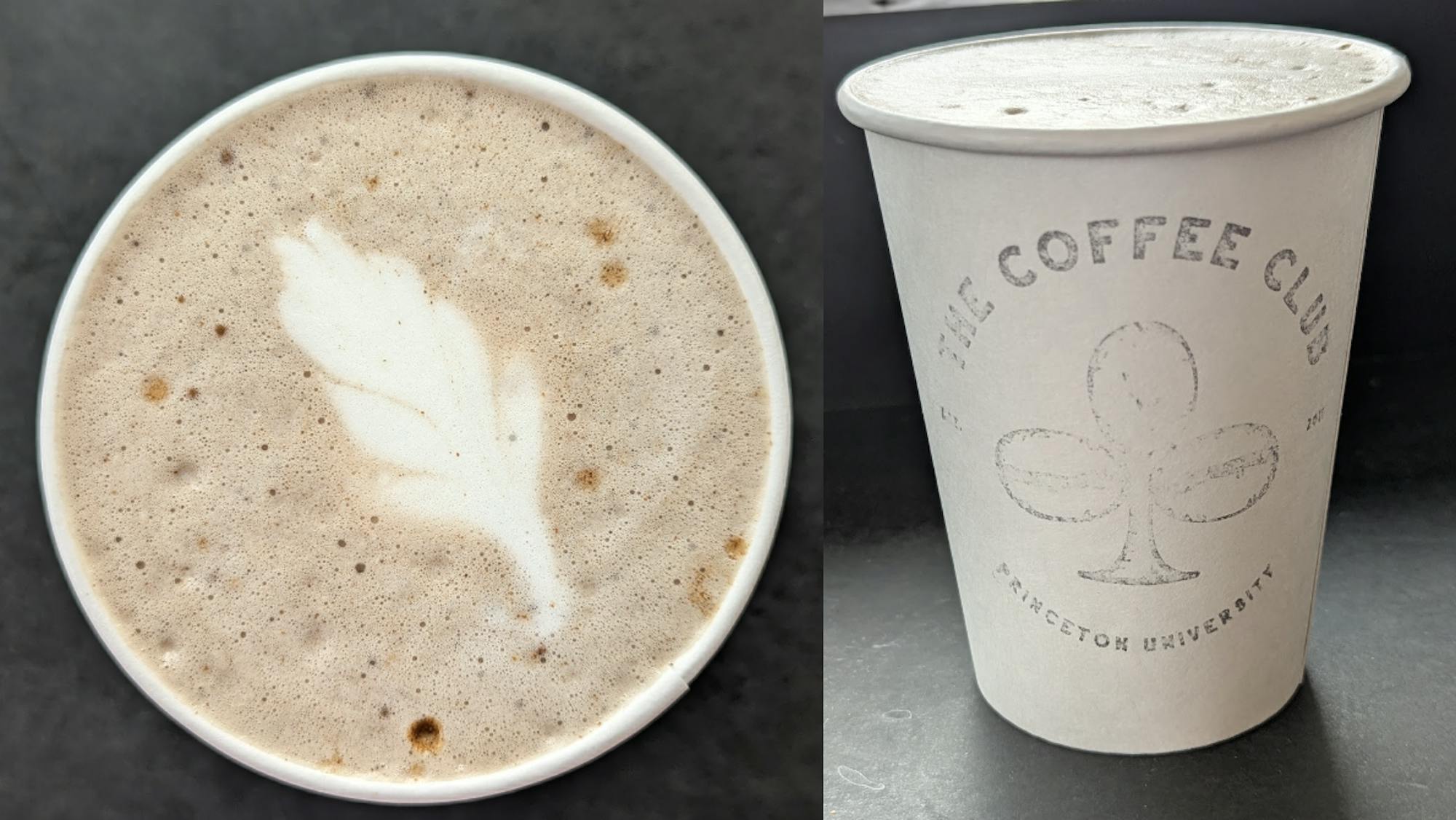 A brown and white swirl of foam is at the top of a white cup with a black coffee club logo. The cup is shown from an aerial and horizontal viewpoint, both against a black background.