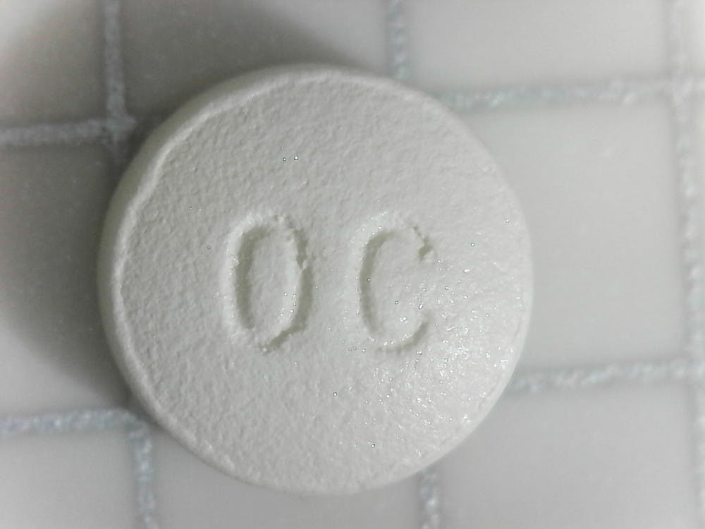 OxyContin_branded_oxycodone_10mg_(OC_side).jpg