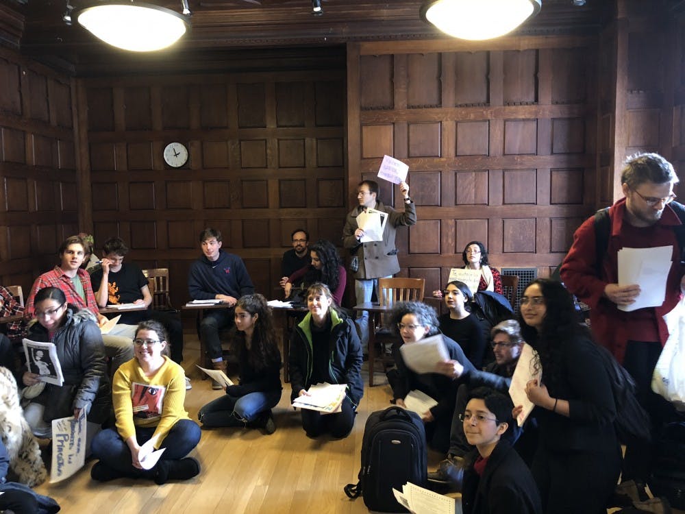 Students demonstrate for feminist goals on International Women's Day. 