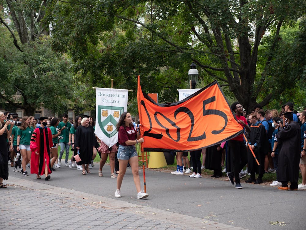 <h5>Class of 2025 students walk at the Pre-Rade.</h5>
<h6><strong>Candace Do / The Daily Princetonian</strong></h6>