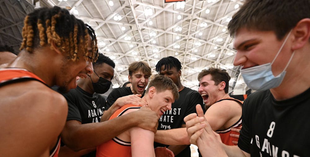 <h6>The men’s basketball team celebrates after Matt Allocco secures the win against Cornell for the Tigers.</h6>
<h6>Courtesy of GoPrincetonTigers.com</h6>
