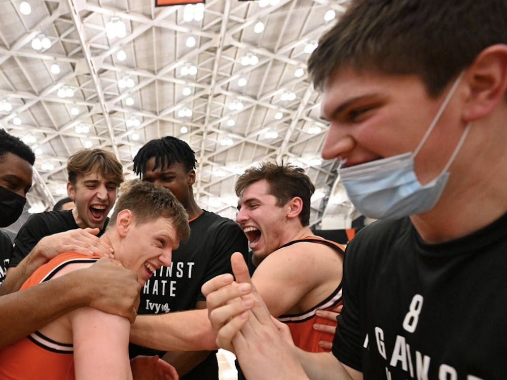 The men’s basketball team celebrates after Matt Allocco secures the win against Cornell for the Tigers.
Courtesy of GoPrincetonTigers.com