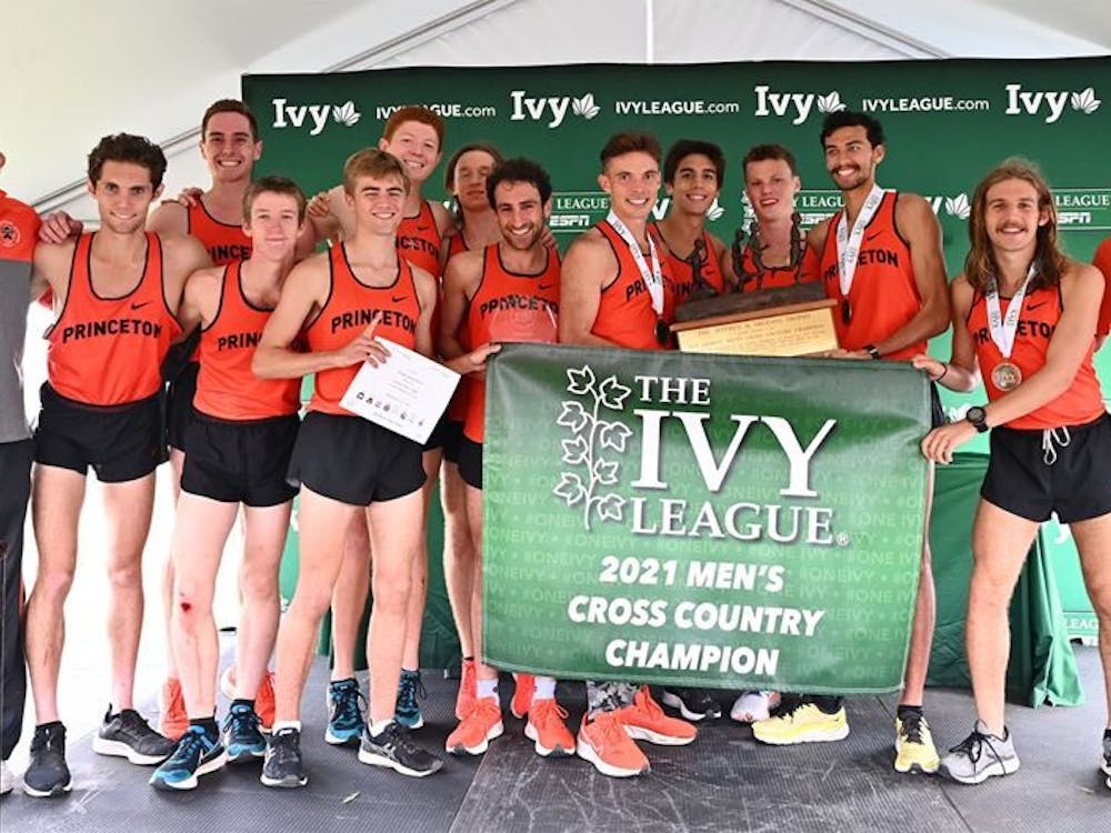 The men's cross country team poses after being crowned Ivy League Cross Country Champion for the 22nd time in program history.
GoPrincetonTigers.com