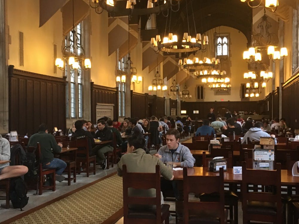 Students eating dinner in Rockefeller College dining hall