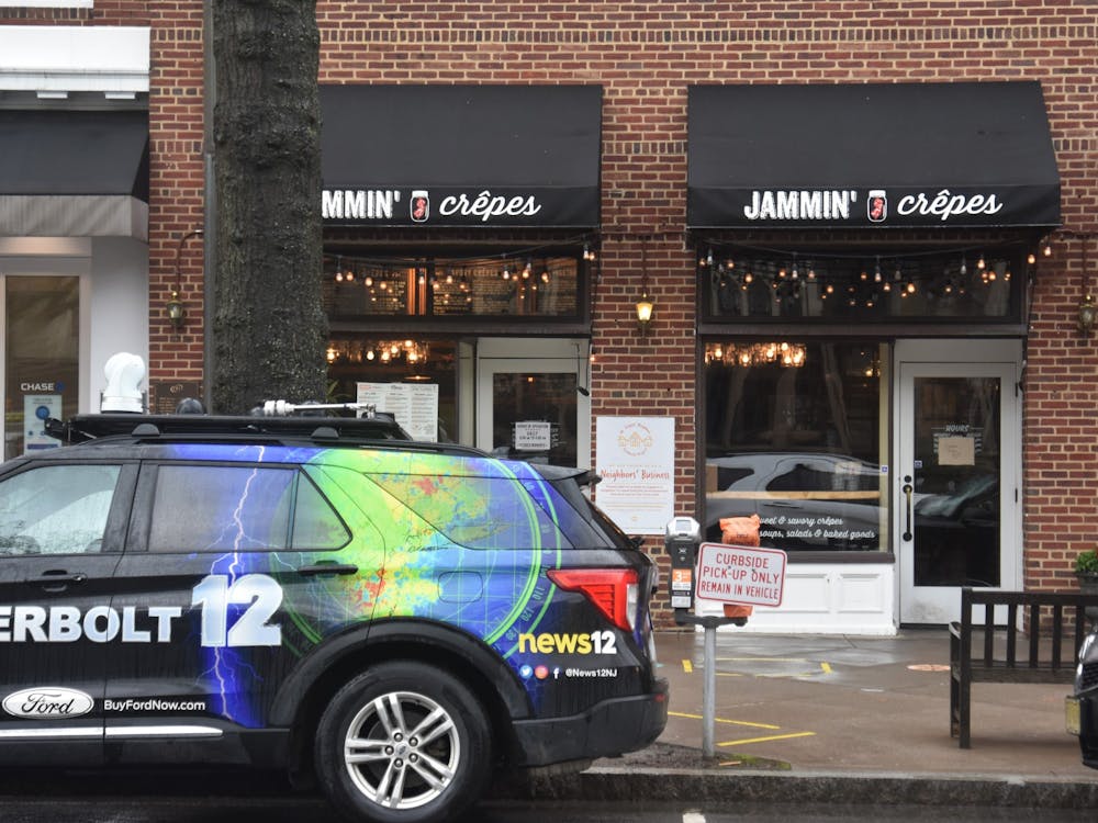 A news truck sits outside Jammin’ Crepes shortly after Gov. Murphy signed a piece of legislation inside.&nbsp;
Mark Dodici / The Daily Princetonian&nbsp;