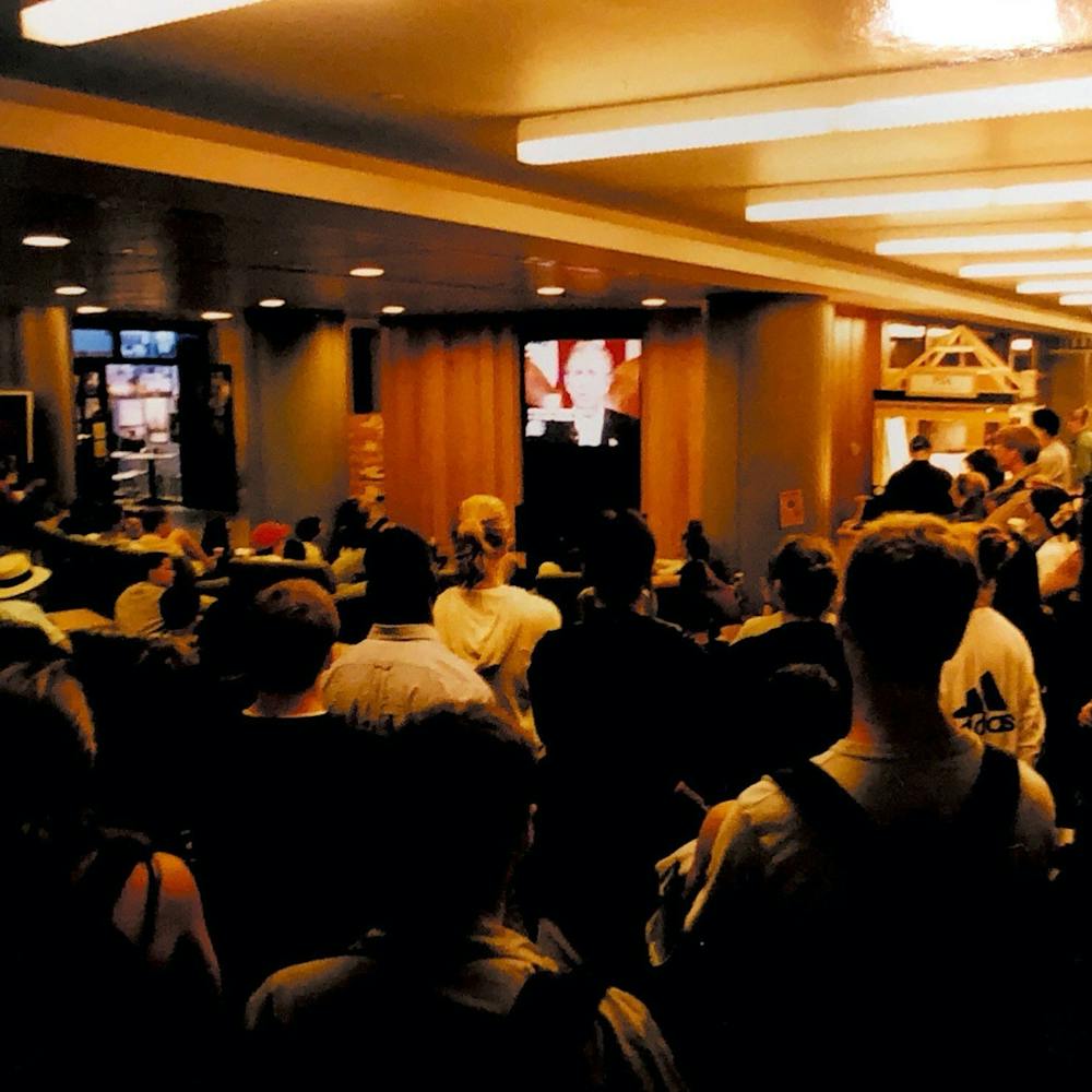 Students gather to watch President Bush's address in Sept., 2001