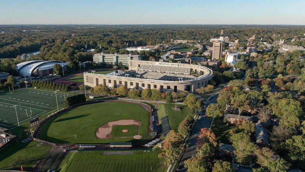 Princeton baseball field seen from aerial view, along with gray football stadium and domed basketball court. 
