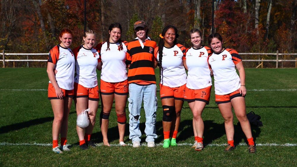 Women’s rugby senior players embrace celebrating their senior day to close out their fall season. 