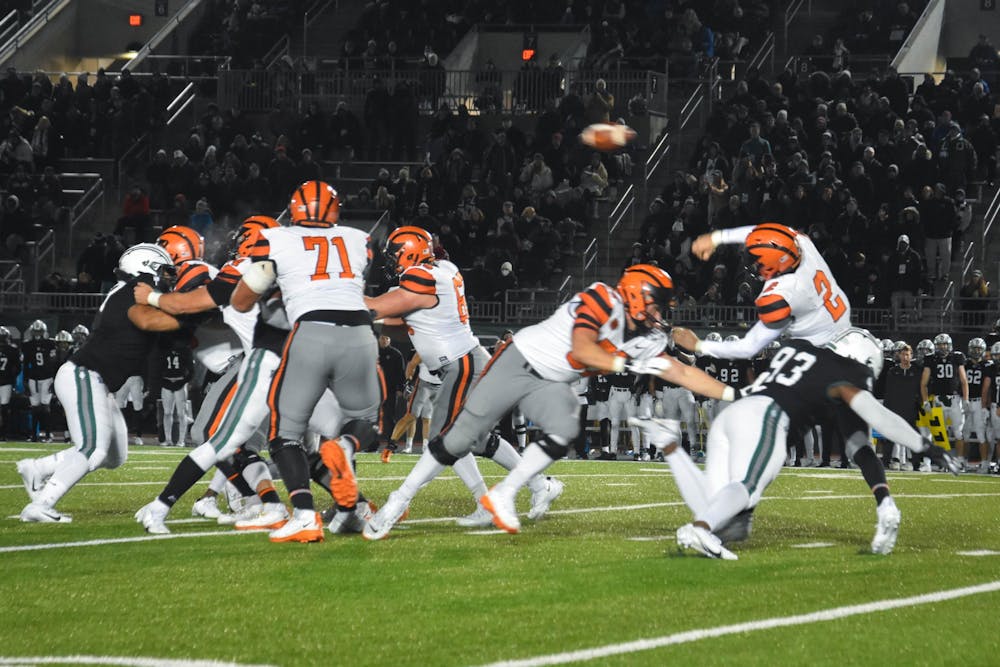 <h5>Princeton senior quarterback Cole Smith was pressured all night long in Princeton’s game against Dartmouth.</h5>
<h6>Mark Dodici / The Daily Princetonian&nbsp;</h6>