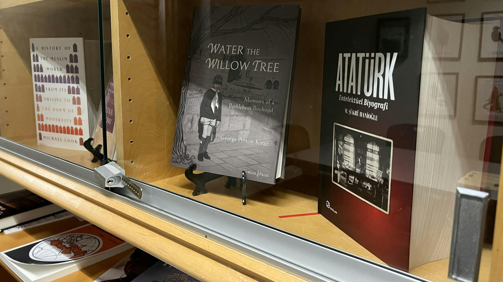 A book is displayed on a shelf.