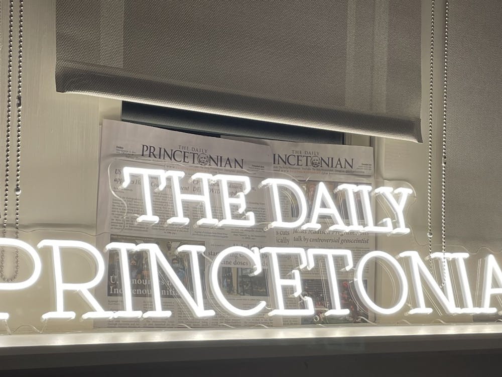 Neon sign reading “The Daily Princetonian.”
Louis Aaron / The Daily Princetonian