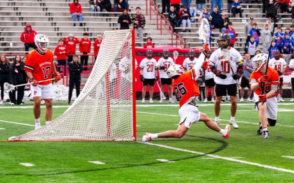 Senior goalie Ryan Croddick making the game winning save to solidify Princeton’s first win against Maryland in 22 years. 