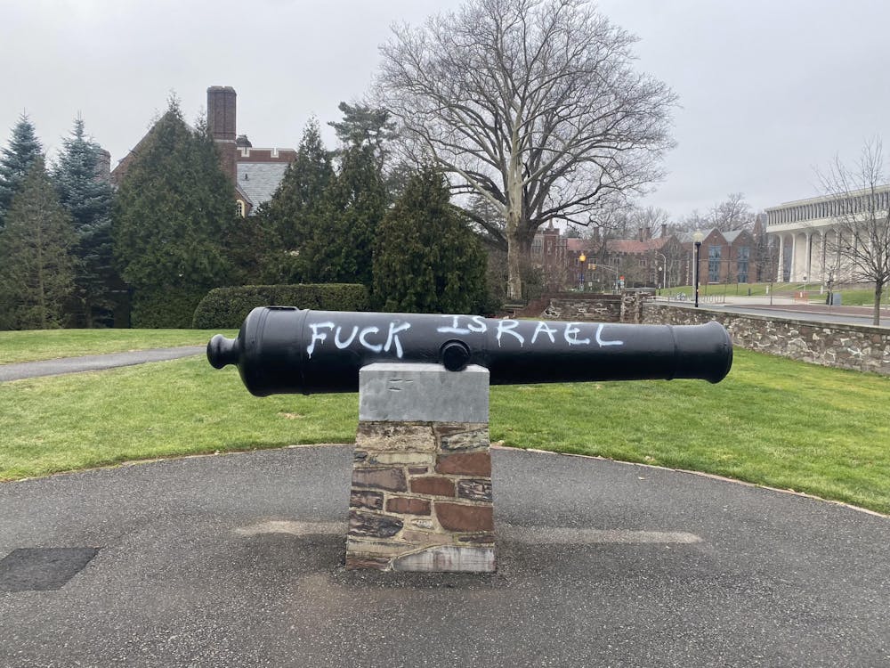 A cannon with the words "F*ck Israel" painted on it