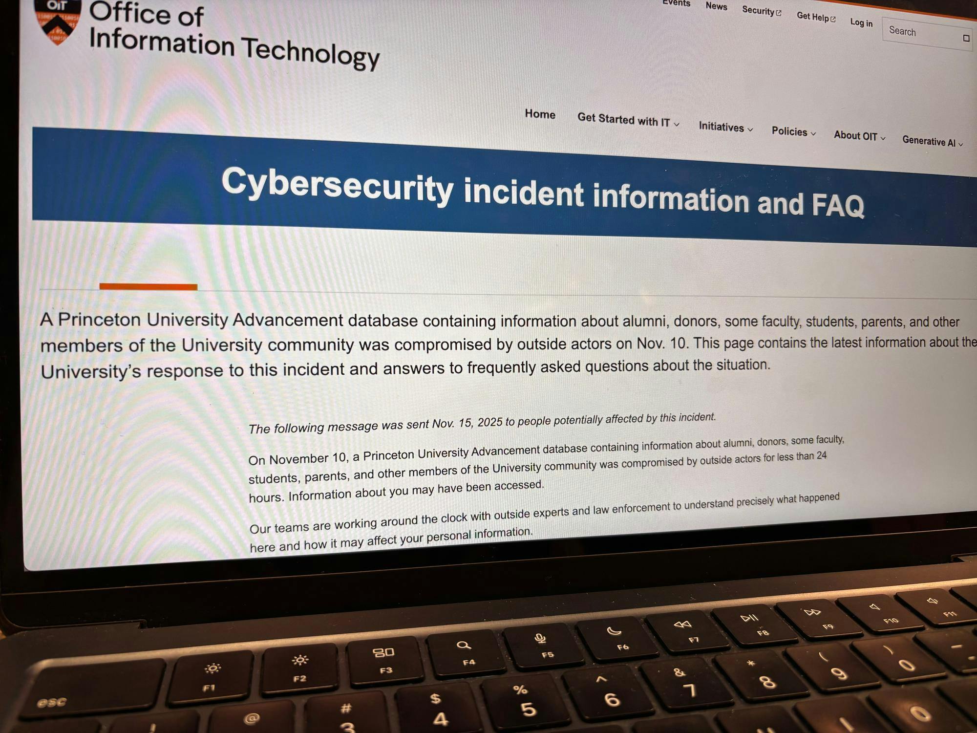 A laptop screen displaying Princeton’s Office of Information Technology page about a cybersecurity incident involving a compromised University Advancement database.