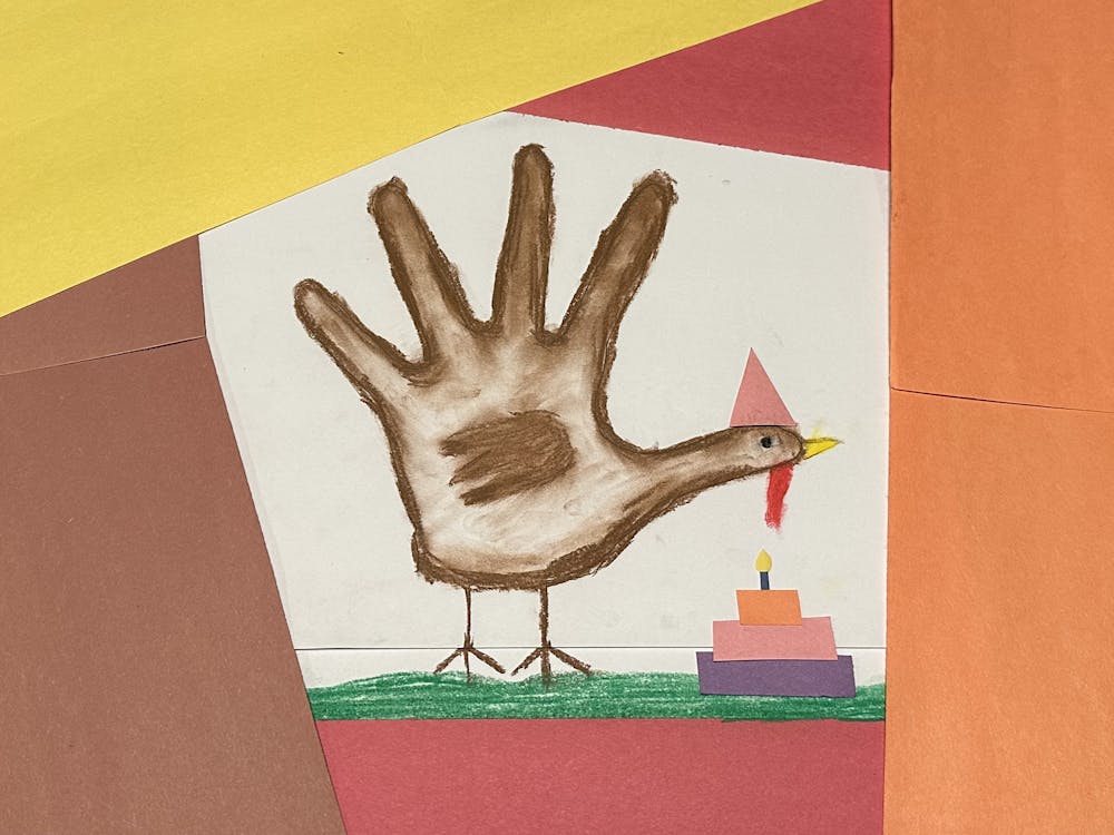 Drawing of a turkey in the shape of a hand.