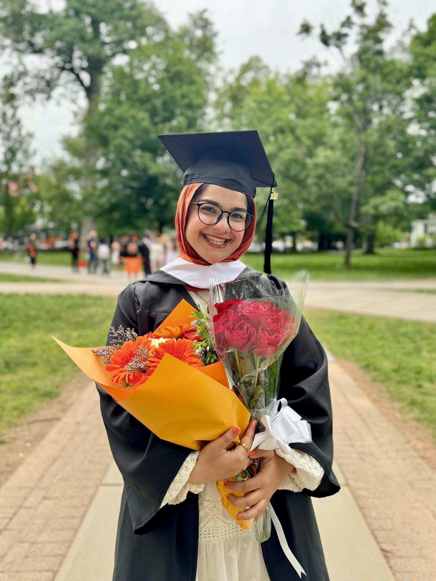 Mahya smiles at her graduation. 