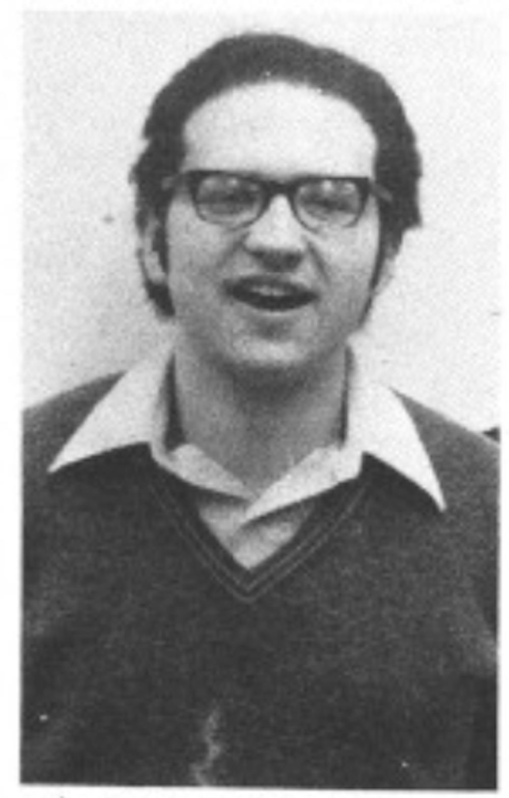 A black and white headshot of David Zielenziger ’74 wearing glasses and an open mouthed expression.