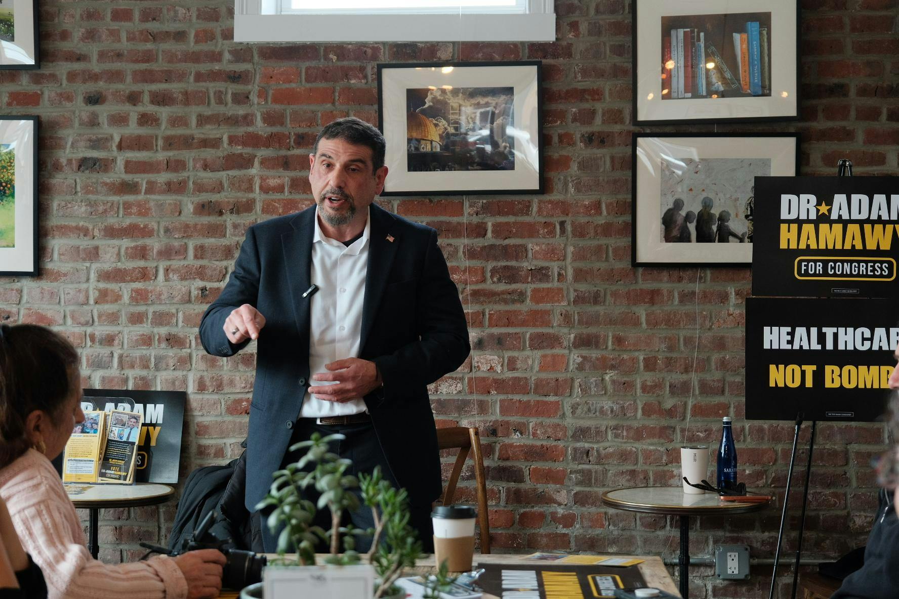 Candidate for NJ-12 Adam Hamawy standing and pointing his finger.