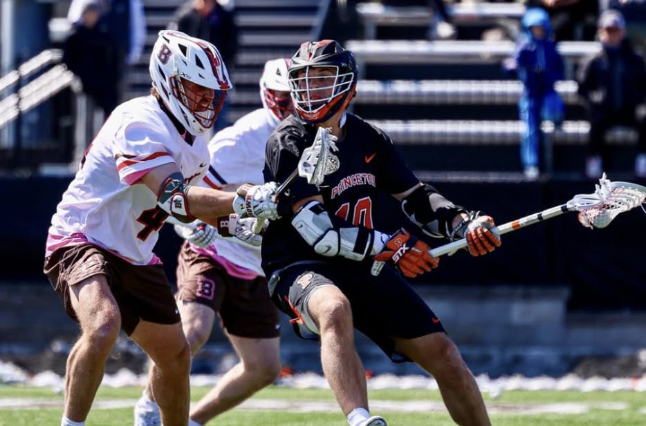 Princeton men's lacrosse player in a black jersey.