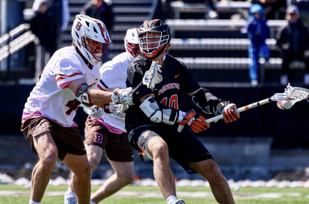 Princeton men's lacrosse player in a black jersey.
