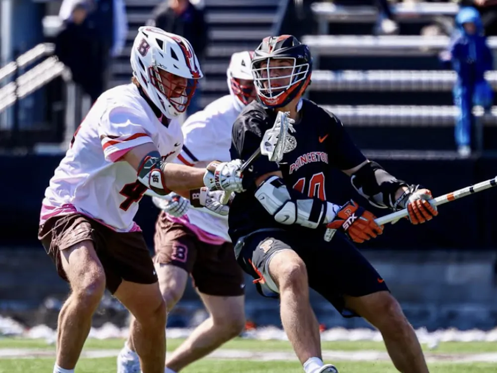 Princeton men's lacrosse player in a black jersey.