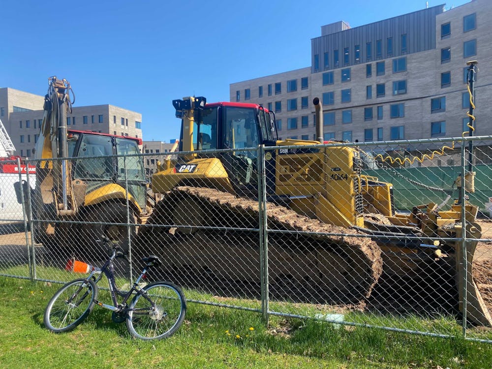 <h5>Caterpillar machinery near New College East and New College West</h5>
<h6>Marie-Rose Sheinerman / The Daily Princetonian</h6>