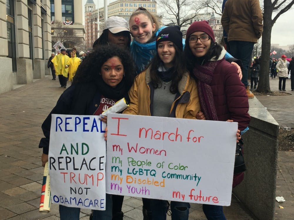 Protestors rally at the parade