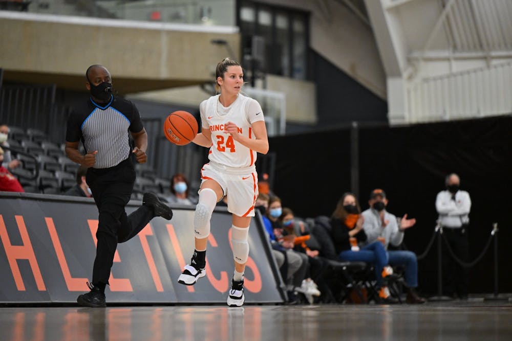 <h5>Junior guard Julia Cunningham takes the ball up the floor during the fourth quarter of Princeton’s win over Brown on Friday.</h5>
<h6>Courtesy of @PrincetonWBB/Twitter.</h6>
<h6><br></h6>