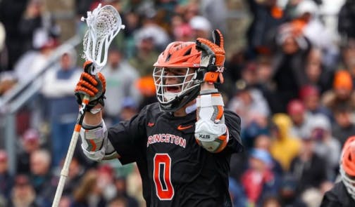 Junior attacker Colin Burns celebrates after he secures the game for the Tigers. 