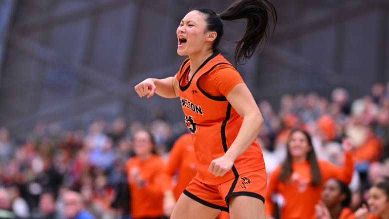 Photo of Princeton women's basketball player Ashley Chea celebrating.