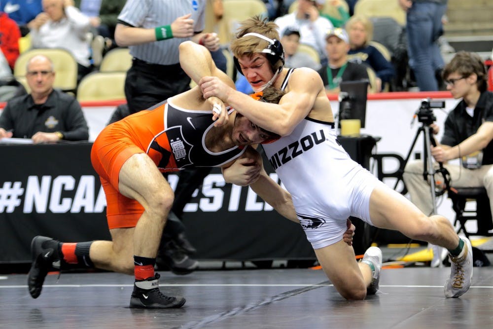 <p>Junior and three-time All-American Matthew Kolodzik readies an opponent for a takedown.</p>
<p>photo credit: Lisa Elfstrum for the Daily Princetonian</p>