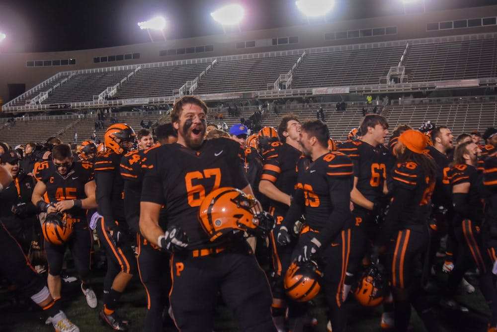 <h5>The Tigers celebrate a win against Yale.</h5>
<h6>Mark Dodici / The Daily Princetonian</h6>