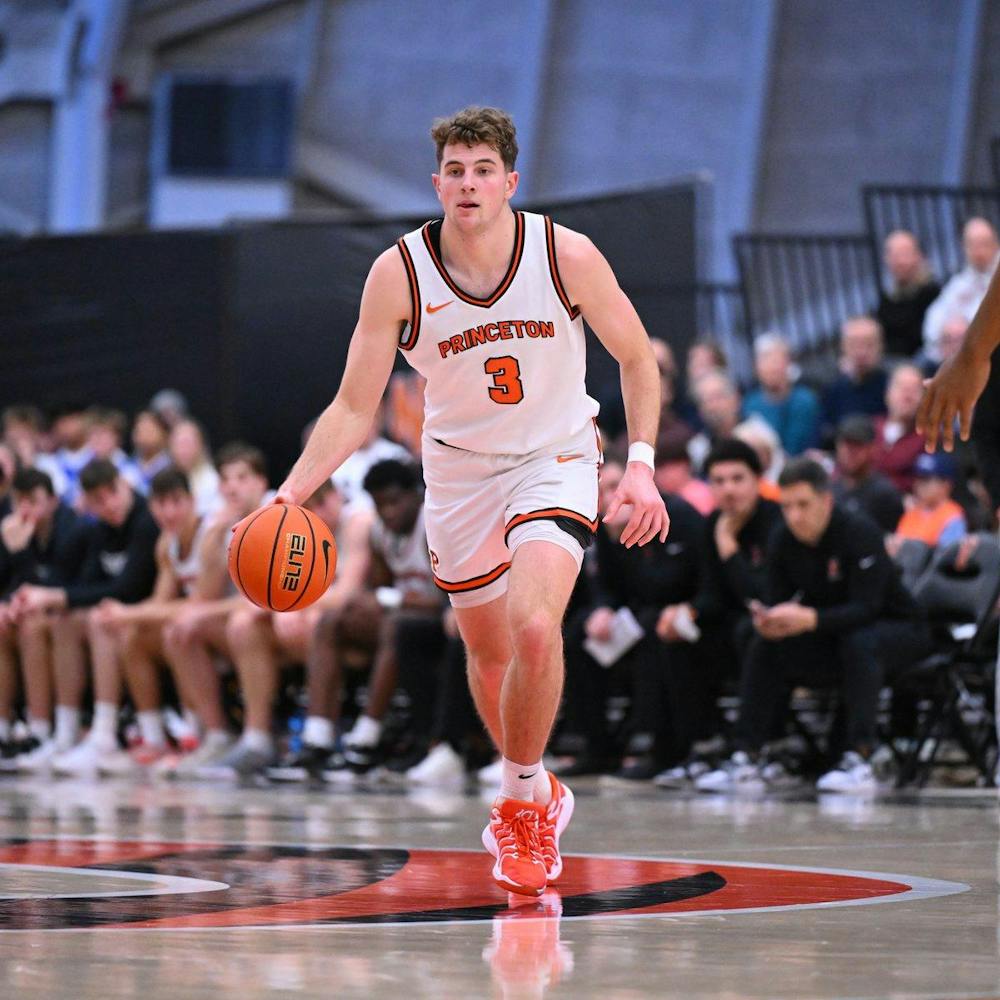 Men's basketball player dribbling the ball