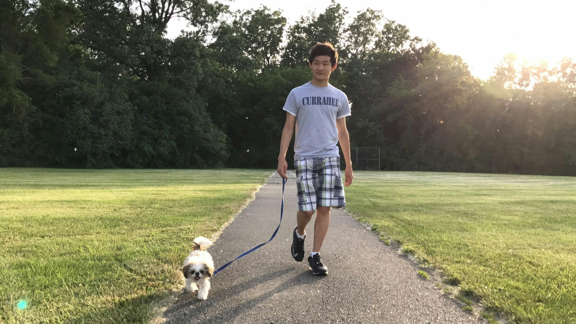Kevin Chang '23 with Dog.JPG