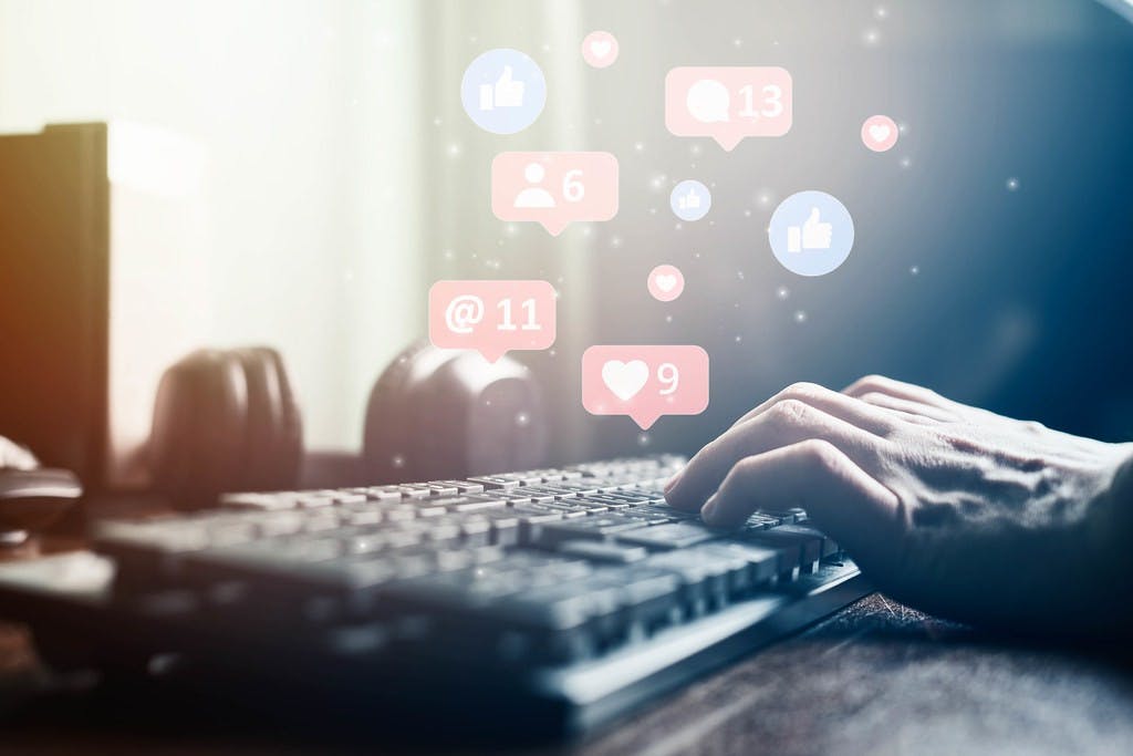 Image of computer with social media likes