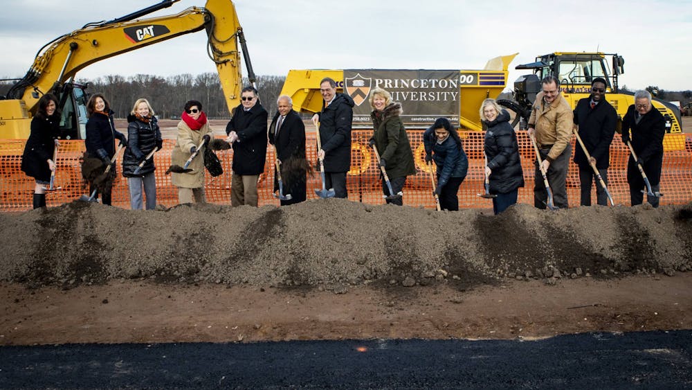 <h5>Several University administrators and local officials dig a big hole for fun. &nbsp;&nbsp;</h5>
<h6>Denise Applewhite / <a href="https://www.princeton.edu/news/2021/12/09/princeton-breaks-ground-lake-campus-development"><u>Office of Communications</u></a></h6>