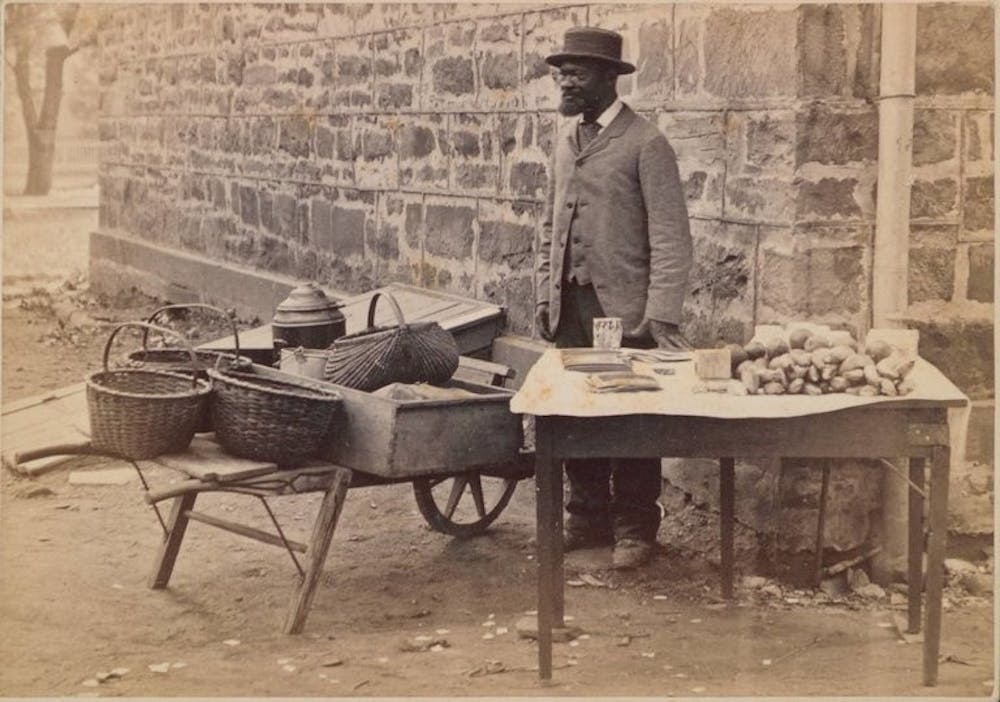 Jimmy Johnson, selling food from his wheelbarrow.