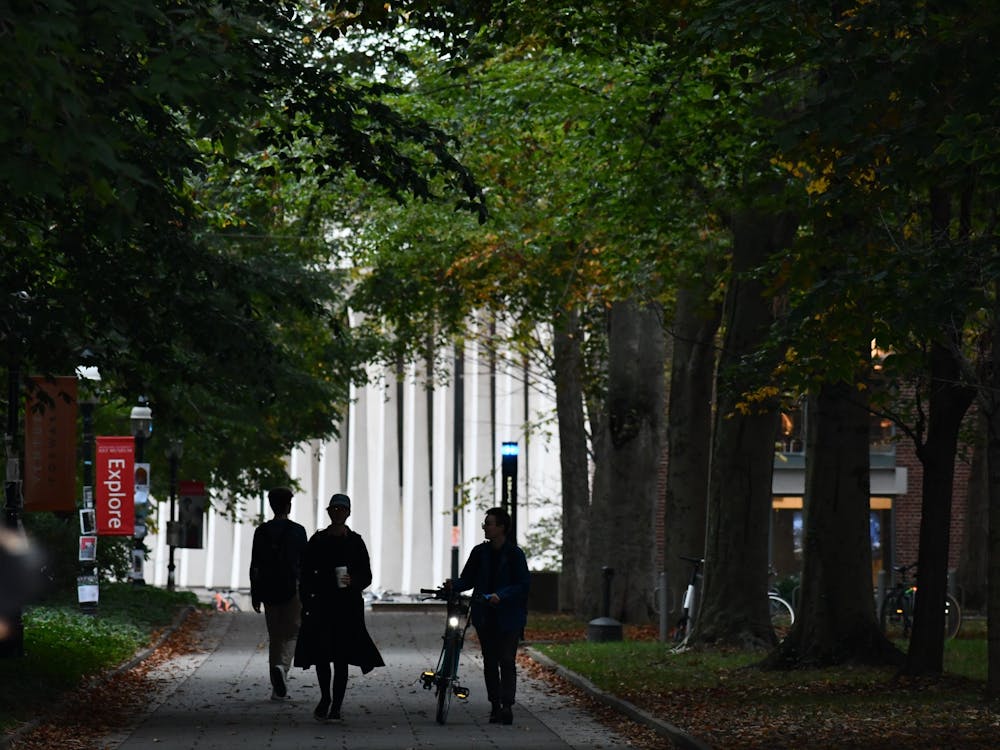 Students chat as they stroll down McCosh Walk at dusk during midterms week.&nbsp;
Natalia Maidique / The Daily Princetonian