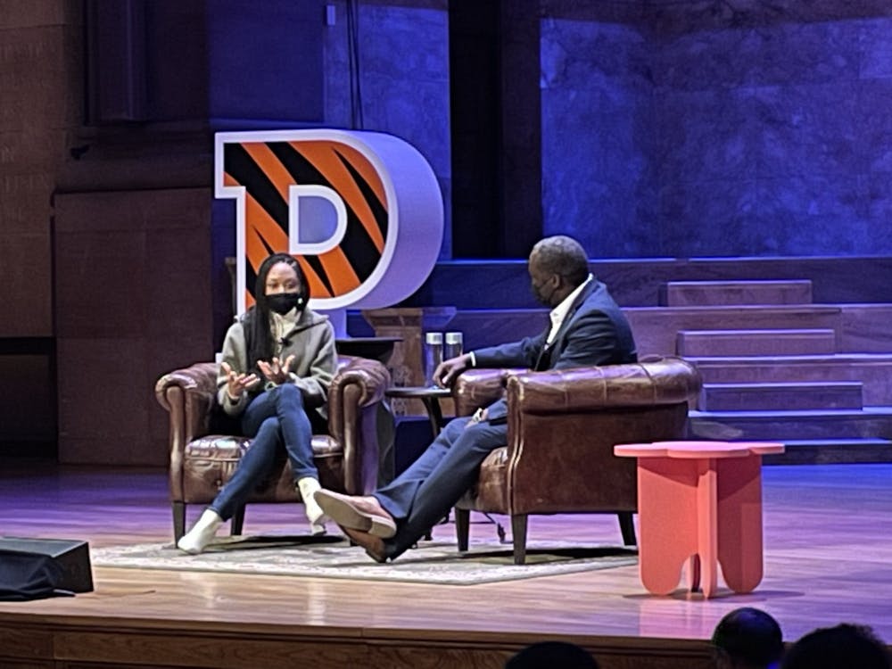 <h5>Felix talking with John Mack ’00 at the Beyond the Resume Wintersession keynote speaker event.</h5>
<h6>Ashley Fan / The Daily Princetonian</h6>