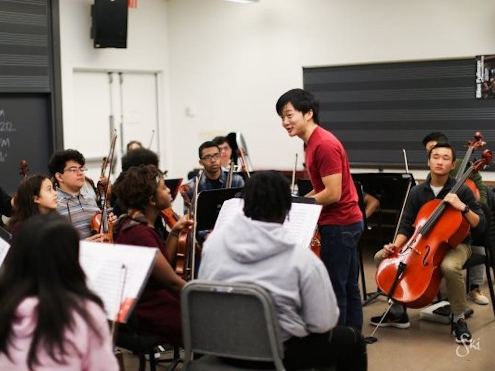 Lou Chen ’19 conducts the Trenton Youth Orchestra