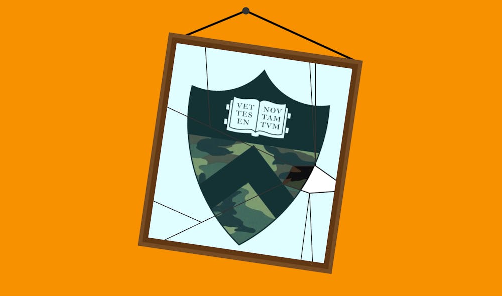 The Princeton logo with camo in a cracked picture frame. 