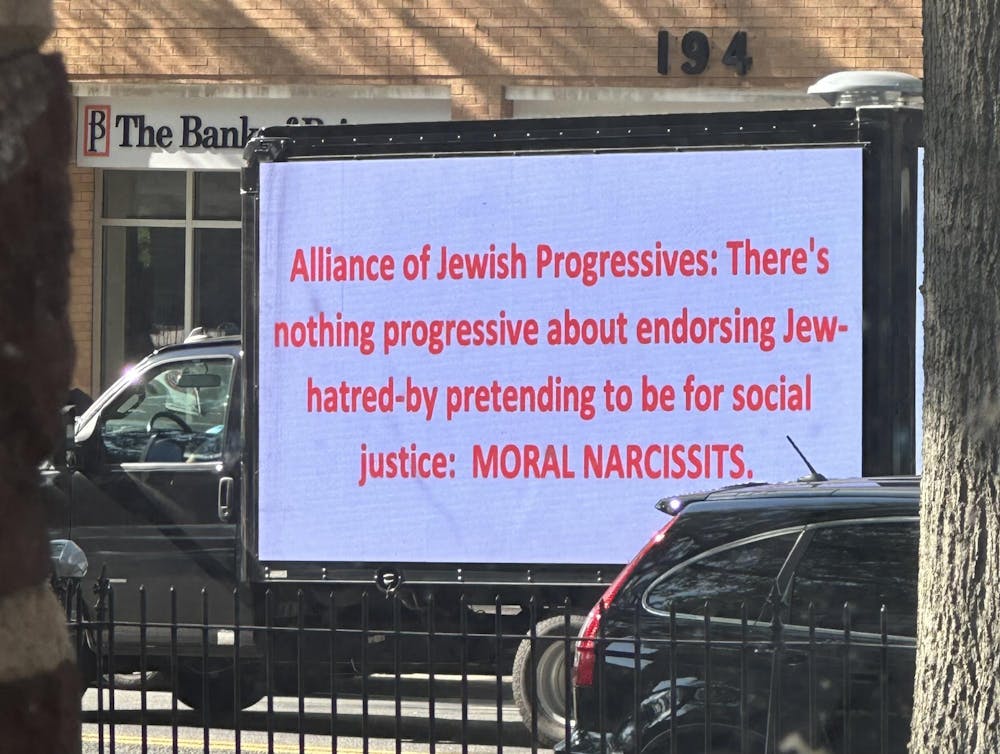 Truck with digital screen that reads "Alliance of Jewish Progressives: There's nothing progressive about endorsing Jew-hatred-by pretending to be for social justice: MORAL NARCISSISTS."